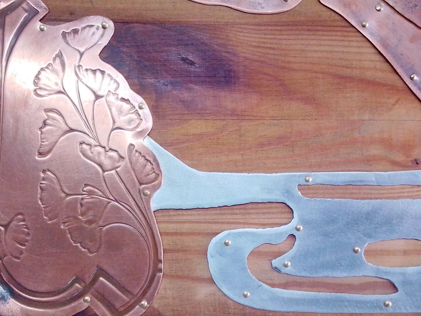 "Lutra" hand tooled wood copper/ metal plaque with decorative otter design
