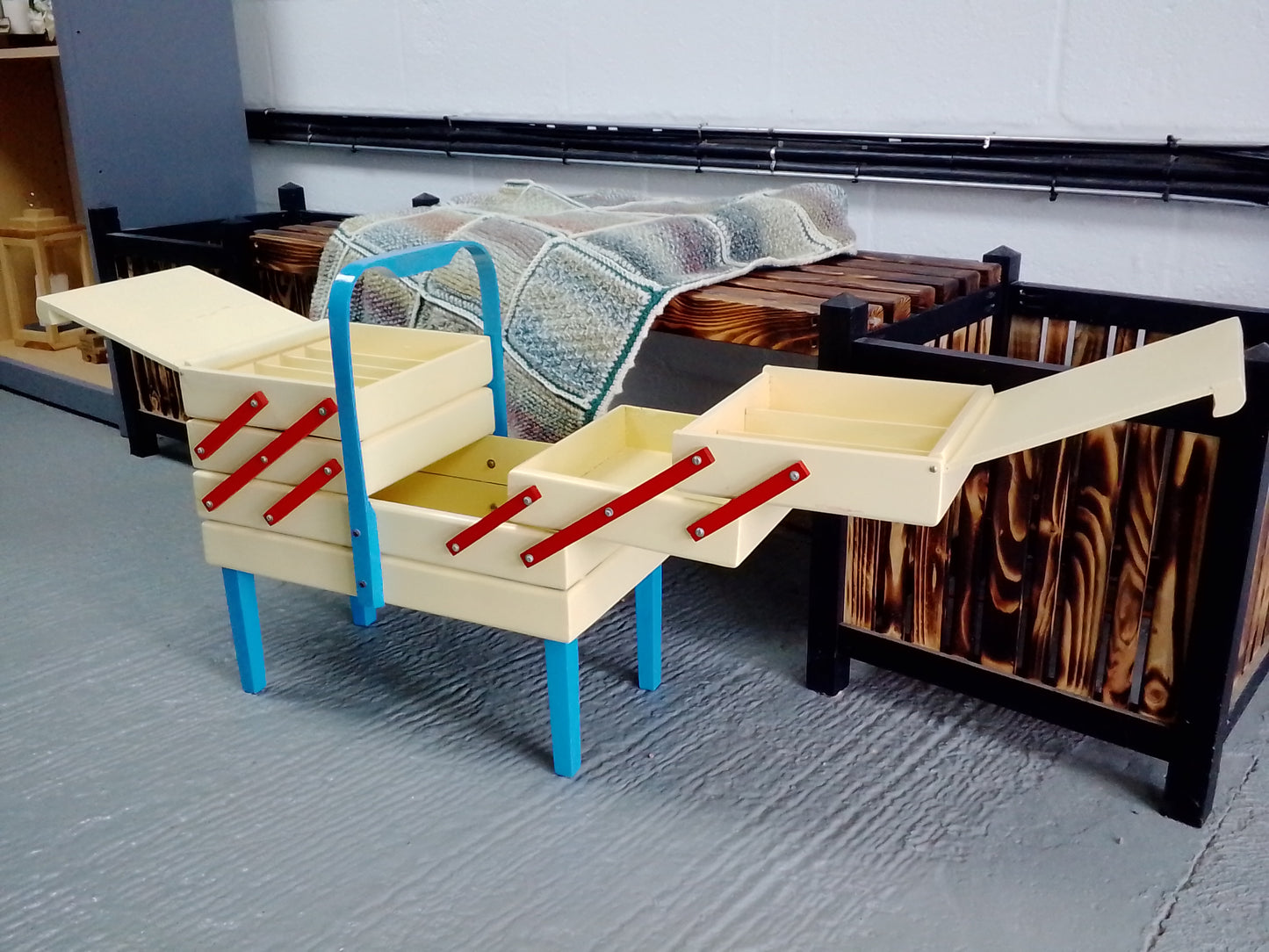 Cantilevered sewing box with removable legs