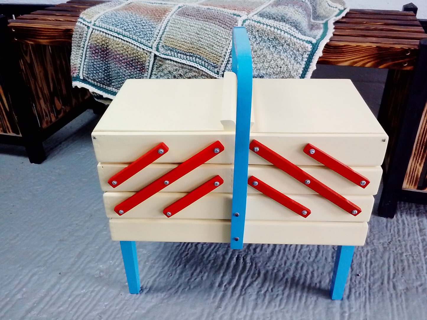 Cantilevered sewing box with removable legs