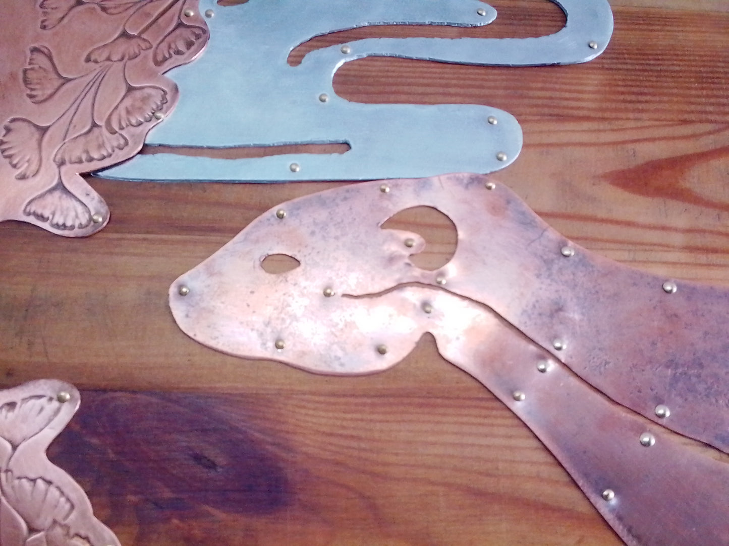 "Lutra" hand tooled wood copper/ metal plaque with decorative otter design